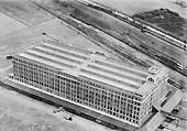 Fourth of five aerial photographs showing the Fort Dunlop factory and sidings together with the adjacent railway