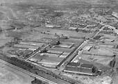 Last of five aerial photographs showing the Fort Dunlop factory and sidings together with the adjacent railway