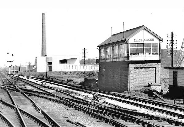 Two views of the western elevation and front of Castle Bromwich Junction Signal Box as seen in 1963