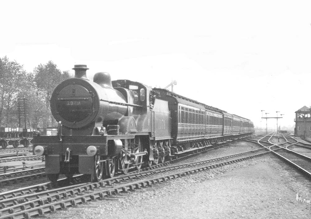 LMS 4P Compound 4-4-0 No 1079 is seen at the head of a Derby to New Street express on 3rd June 1925