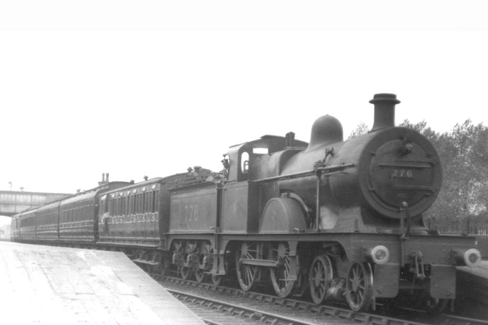 Ex-MR 3P 4-4-0 No 776 stands at Castle Bromwich's up platform on a local service on 3rd June 1925