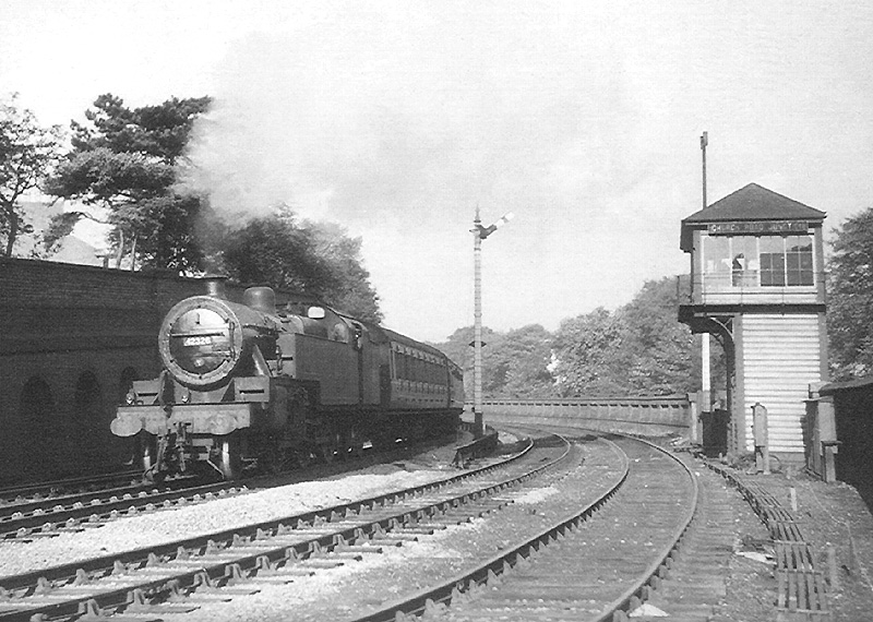 Ex-LMS 2-6-4T 4MT No 42326 passes by Church Road Junction signal box with an empty stock working circa 1953