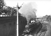 Ex-LMS 4-6-0 5MT No 45250 is working hard at the head of a down express passenger service on 31st July 1955