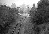 Looking towards Whitacre with the station  on the right and the goods siding on the left with the level crossing in between