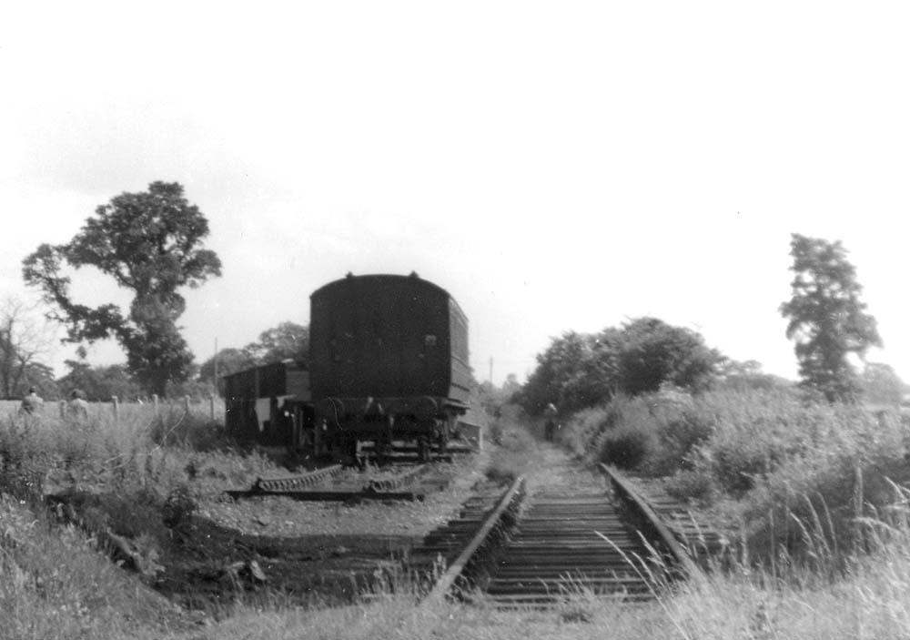 Close up showing  a Victorian four-wheeled coach probably once used for storage and mess purposes