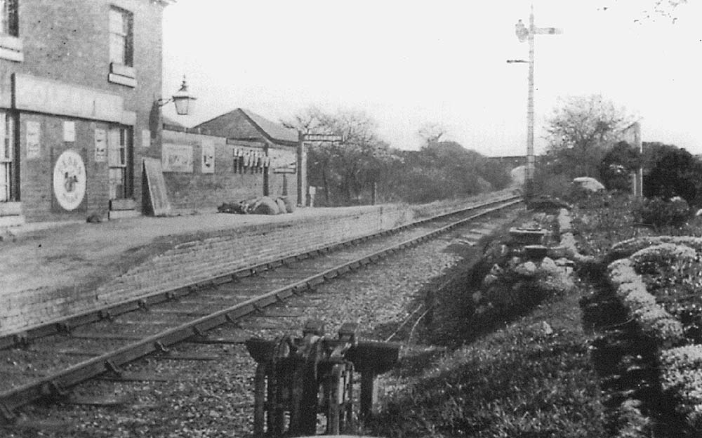 View of Coleshill station on the left and the former down line track bed and probable remains of the down platform