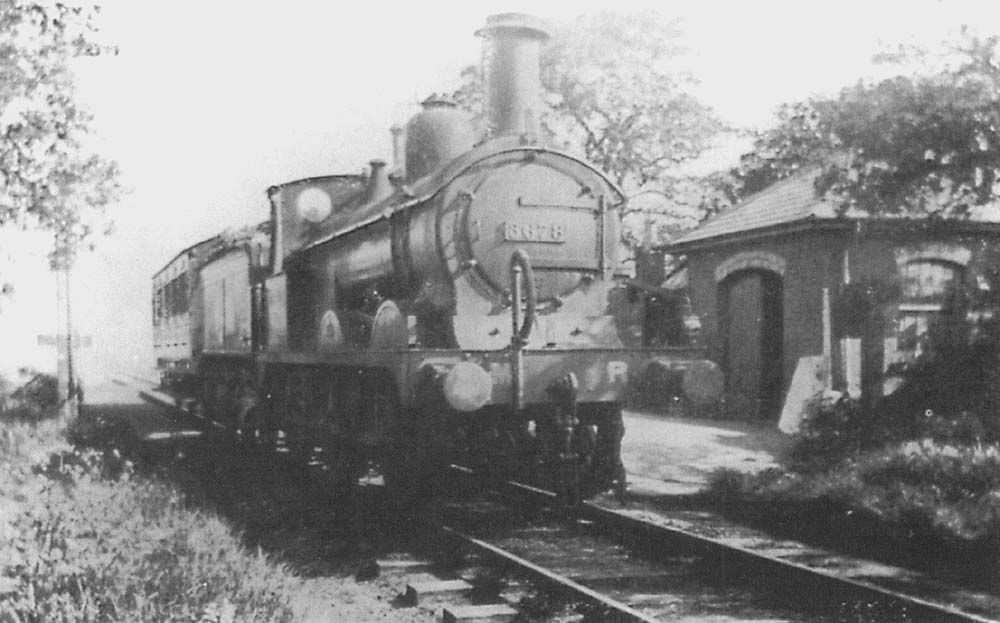 MR 2F 0-6-0 Class 1873 No 3678 is seen at the head of the 8.10am Whitacre to Hampton train as it departs Coleshill station
