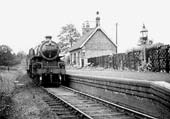 Ex-LMS 4MT 2-6-0 Mogul No 43013 stands at the head of an Ashchurch to Birmingham train 