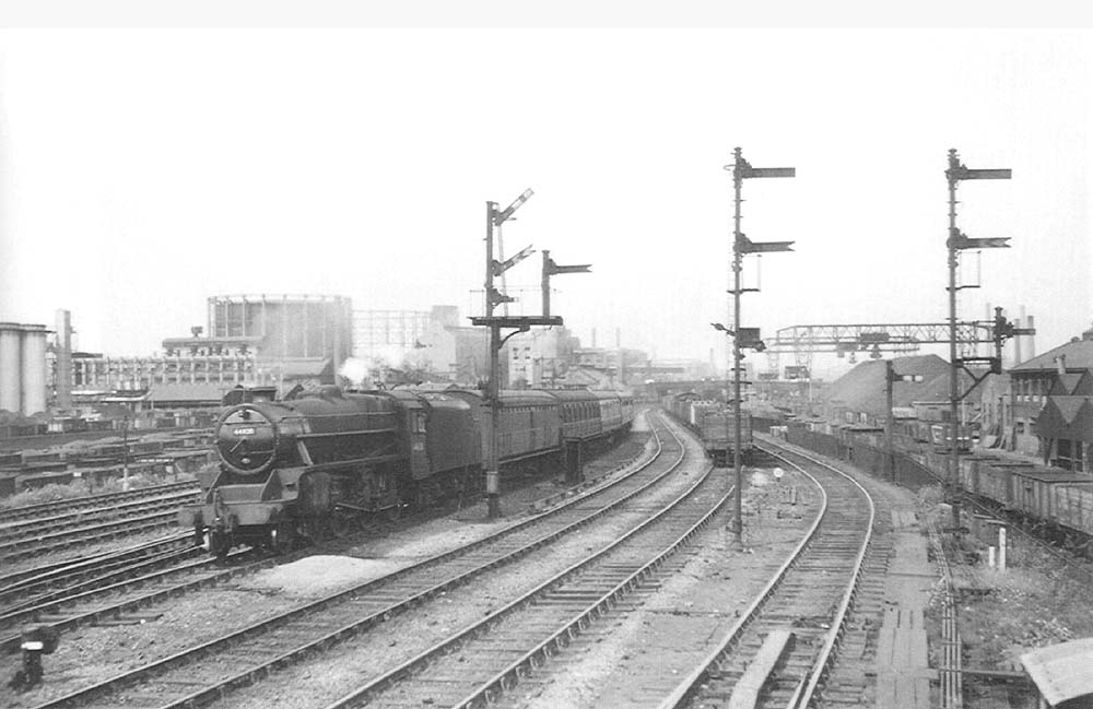 Ex-LMS 5MT 4-6-0 No 44828 is seen approaching Duddeston Road signal box with an Ordinary train for New Street station