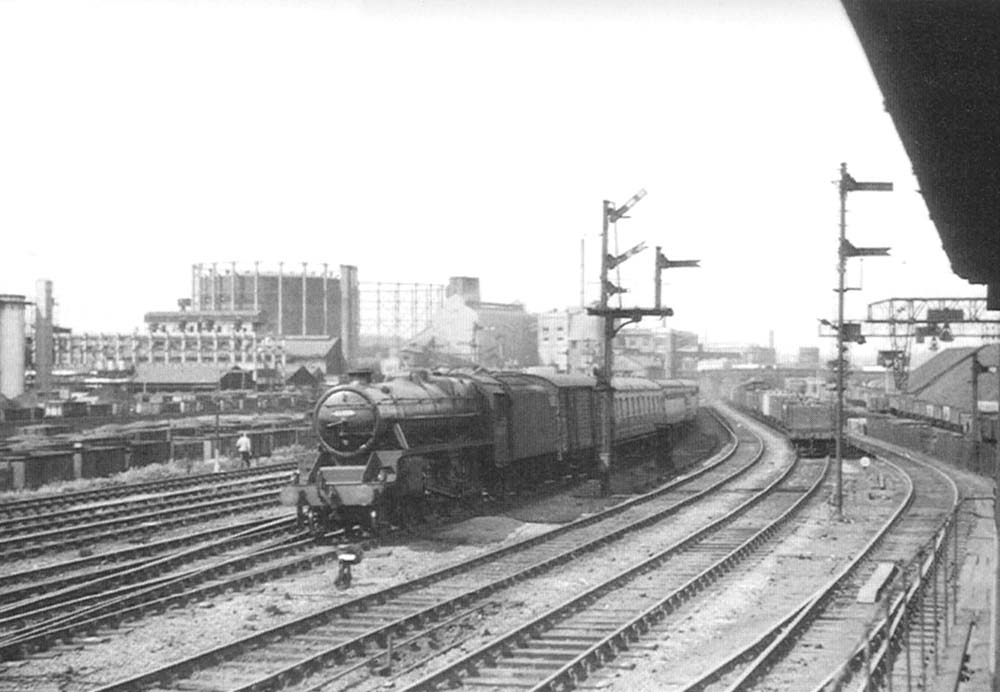 Ex-LMS 5MT 4-6-0 No 45059 passes Duddeston Road Junction signal box with a down express train for New Street station on 5th July 1953