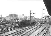 Ex-LMS 5MT 4-6-0 No 45059 passes Duddeston Road signal box on a down express train for New Street station
