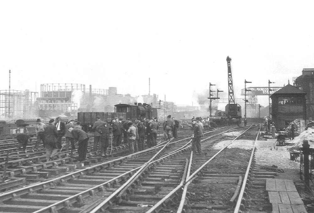 Track replacement is being carried out on the junction adjacent to Duddeston Road signal box on Sunday 1st August 1954
