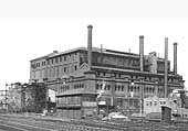 Duddeston Road Junction signal box being dwarfed by Saltley Gas Works as seen on Sunday 25th April 1954