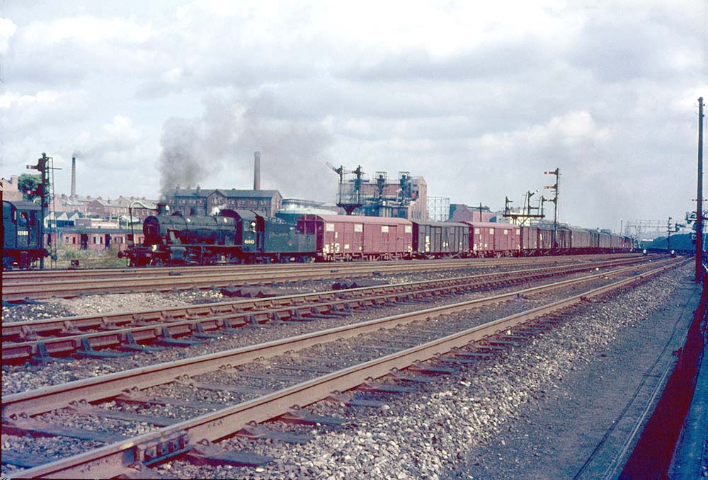 British Railways built Ivatt Class 2MT No 46443 heads a train into Lawley Street sidings opposite to Saltley Depot