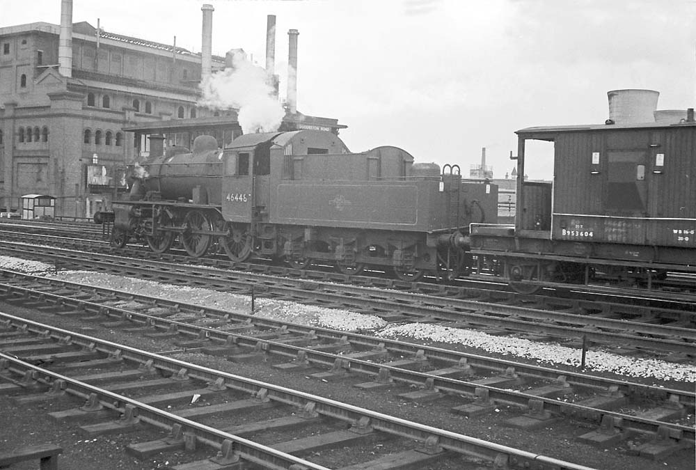 Another view of BR built 2MT 2-6-0 No 46448 with brake van in tow now passing Duddeston Signal Box