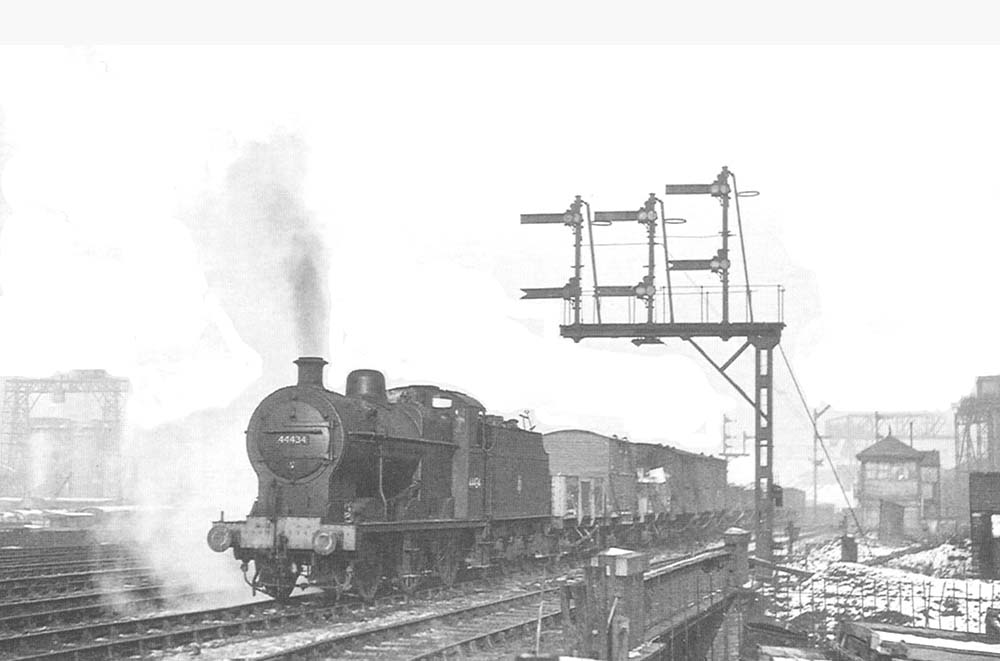 Ex-LMS 4F 0-6-0 No 44434 heads a Class K stopping freight service on the down Camp Hill line on Sunday 30th November 1952