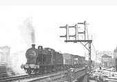 Ex-LMS 4F 0-6-0 No 44434 heads a Class K stopping freight service on the down Camp Hill line on Sunday 30th November 1952