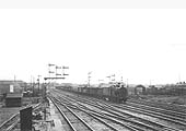 An unidentified ex-LMS 4F 0-6-0 goods locomotive is seen approaching Duddeston Road Junction signal box