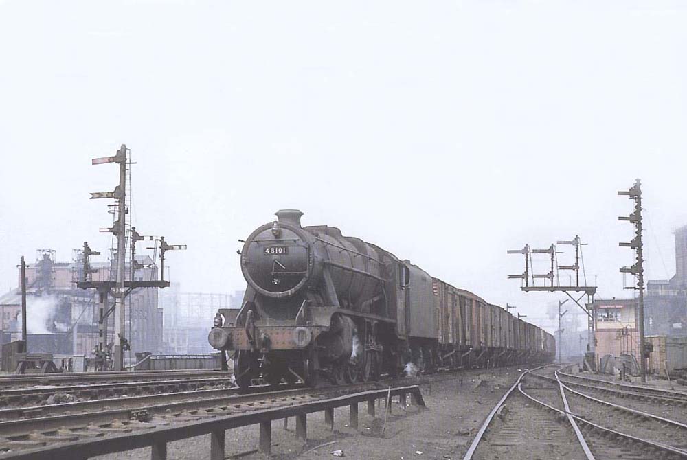 Ex-LMS 8F 2-8-0 No 48101 is working hard as it is banked up Camp Hill with a Class 5 fast freight on Saturday 28th July 1962