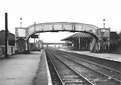 Looking West along Evesham station's down platform towards Ashchurch on 13th November 1962