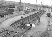 Looking towards Ashchurch with an unknown MR 0-6-0 standing at the head of a up local passenger service