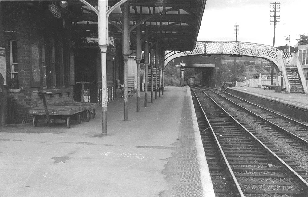 A view looking north towards Redditch along Evesham station's up platform in 1962