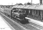 Ex-GWR 0-6-0PT No 4614 passes through the station on the 1:15pm Ashchurch to New Street service on 1st June 1963