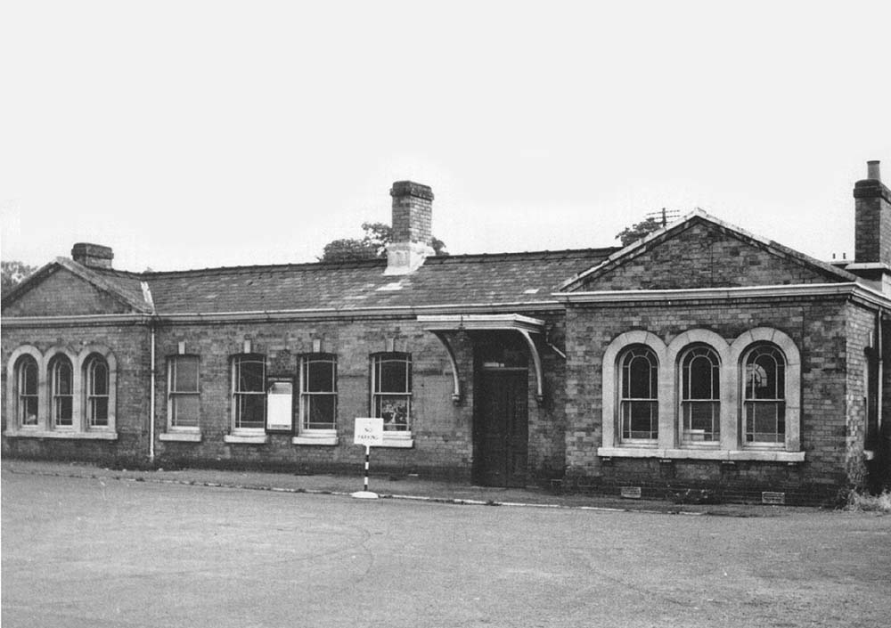 A late British Railways view of the exterior and forecourt of Evesham station which was located on the up platform