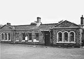 A late British Railways view of the exterior and forecourt of Evesham station which was located on the up platform
