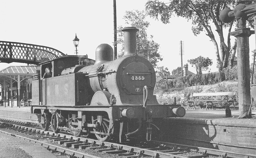 MR 1P Johnson 0-4-4T No 1353 is seen having just worked a Ashchurch to Evesham goods train