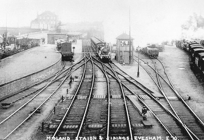 Looking towards Redditch with a local passenger train to Aschurch passing the old signal box
