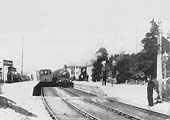 Looking towards Ashchurch with an unknown MR 0-6-0 standing at the head of a up local passenger service