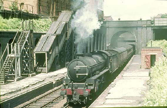 Stranger in the camp as ex-LNER B1 design, No 61315 heads a Birmingham-West Country Saturday holiday relief