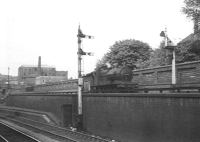 Ex-MR 0-6-0 3F No 43203 is seen standing on the down line running towards Church Road Junction