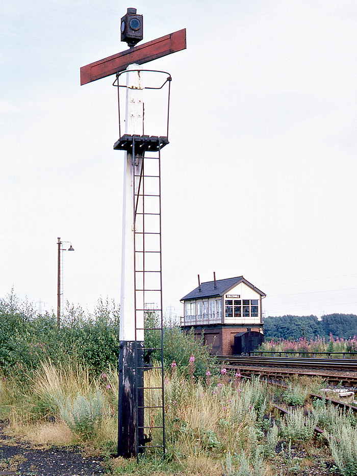View of Coleshill Signal Box with Hams Hall CEGB sidings signal in the foreground on 3rd August 1969