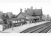 An Edwardian view of Forge Mills station showing the up platform which accommodated the principal buildings