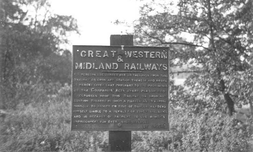 A cast-iron Great Western & Midland Railways Trespass Notice mounted at Frogmill Crossing on 11th July 1954
