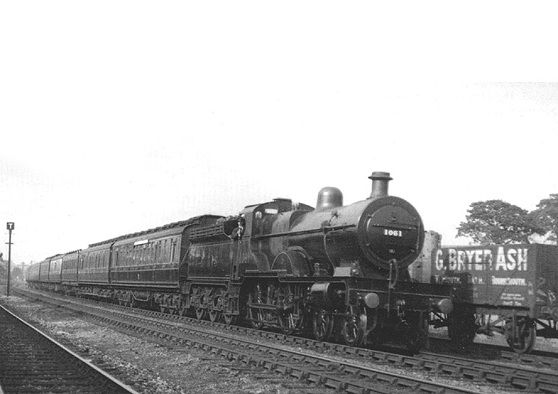 LMS 4P 4-4-0 Compound No 1061 is seen at the head of a relatively heavy express service on 26th June 1929