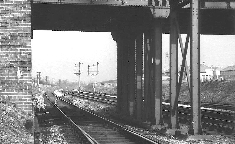Looking beneath Longbridge Lane bridge towards Northfield station with the up slow on the left on 12 March 1962