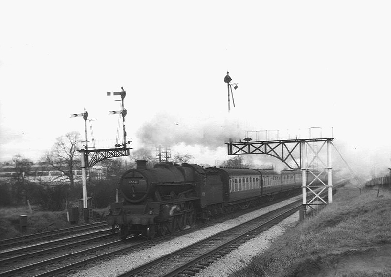 Ex-LMS 5XP 4-6-0 Jubilee class No 45561 'vvv' passes Halesoweb Junction's Distant signals on 28th December 1954