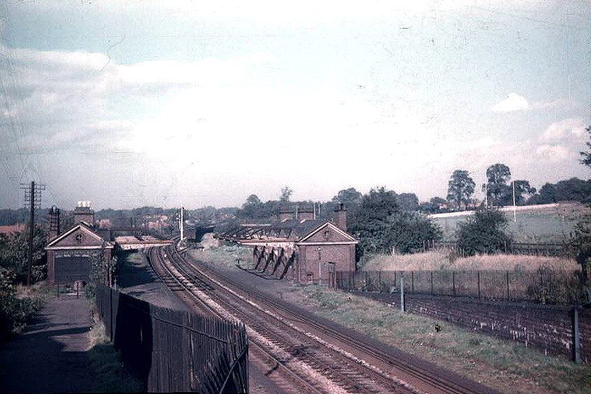 Looking towards Camphill from Cartland Road bridge with the ramp to the up platform on the left on 29th September 1956