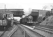 Ex-LMS 0-6-0 4F No 44411 passes Hazelwell signal box at the head of a Class E express freight service
