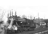 Ex-WD 2-8-0 No 90102 is seen running tender first towards Hazelwell signal box on 17th January 1954