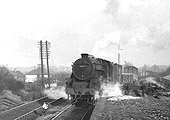 Ex-LMS 4-6-0 'Black 5' No 44917 is seen 'setting back' in to the down refuge siding at Hazelwell station