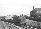 Ex-MR 0-6-0 3F No 43223 passes beneath Fordhouse Lane bridge on a Class K stopping freight of empty wagons
