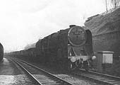 British Railways 2-10-0 9F No 92046 passes Hazelwell's down refuge siding whilst at the head of a Class J train