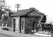 Close up showing Kingsbury station's brick built waiting room situated on the down platform