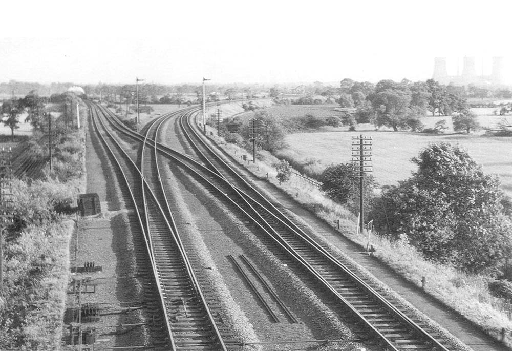 Looking towards Whitacre as an up goods train is seen working very hard on a freight to Derby on 30th June 1959