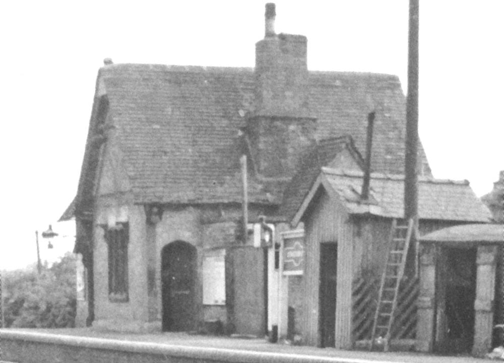 Close up showing the door from the booking office and porter's room to the up platform