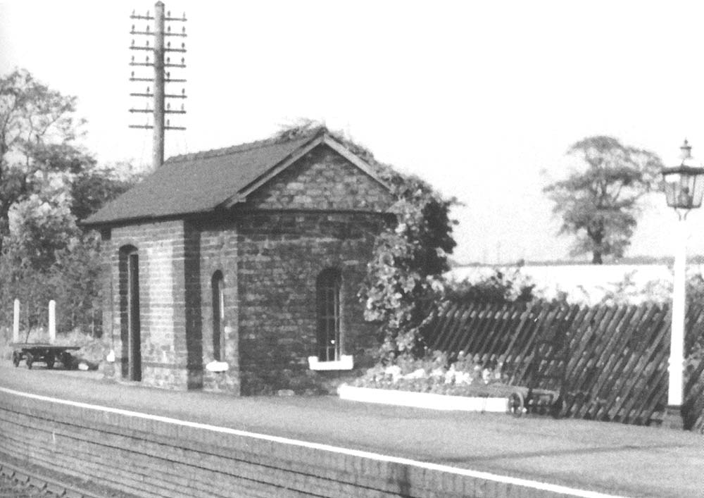 Close up showing Kingsbury station's brick built waiting room situated on the down platform